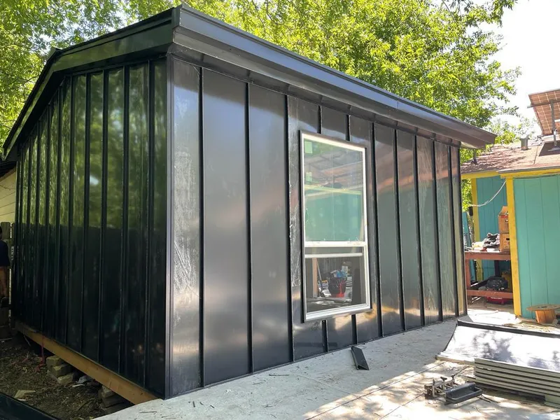 Black standing seam metal wall panels for Metal Roof Installation in West Jefferson