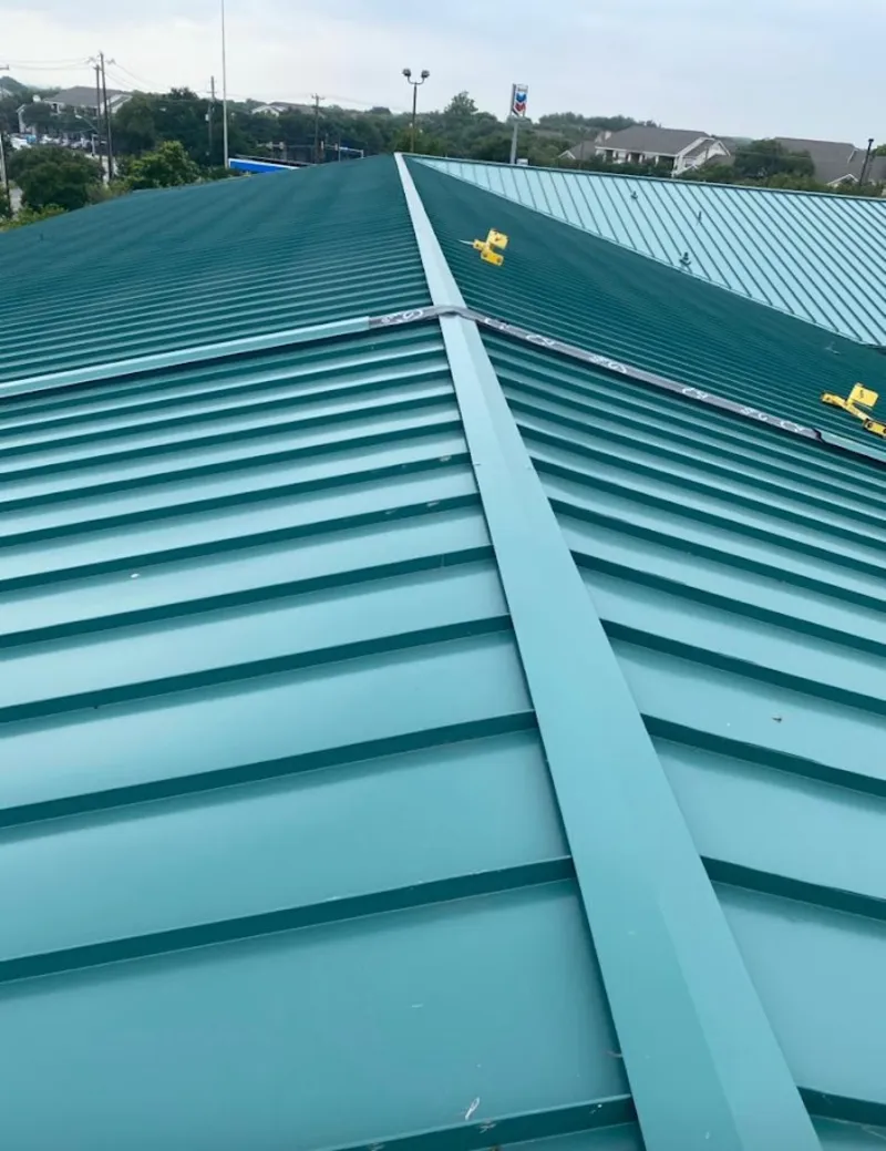Green commercial metal roof ridge and valley for Metal Roof Repair in West Jefferson