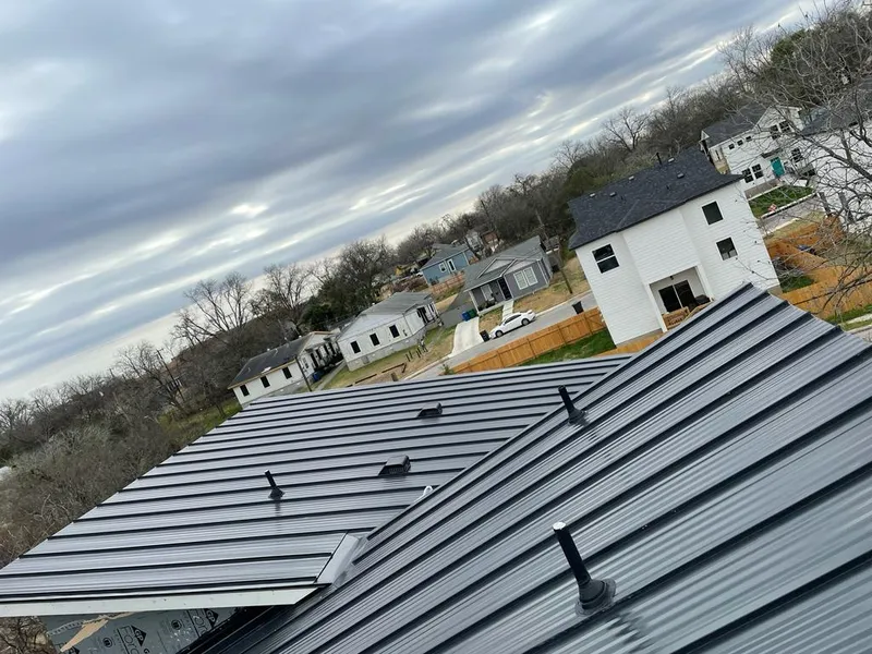 Standing seam metal roof panels with vents for Skylight Repair in West Jefferson